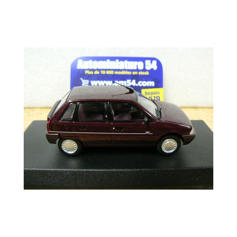 Ici une petite Citroën AX Ten de 1993 vue à Retromobile cette Ici une petite Citroën AX Ten de 1993 vue à Retromobile cette